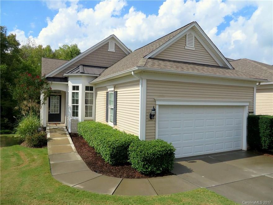 Gorgeous Gray Myst with sunroom and unfinished basement. Study/Den w/closet. Private backyard with wooded view. Tile floors in the kitchen and foyer.  Kitchen features  Stainless Appliances, Built in Desk, Hardwoods, & Nook.  Spacious Great Room w/ Formal Dining Area. Bright sunroom opens to deck overlooking woods. Unfinished basement offers flexibility in design and function and all the storage space you need.