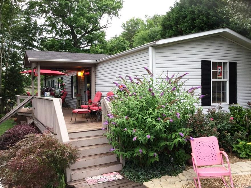 Beautifully landscaped pond-front home. Many recent renovations and upgrades including a new kitchen. All appliances, including washer and dryer, to stay. Enjoy the peaceful, park-like setting in the yard bordering the neighborhood pond. Concrete furniture, fire pit, horseshoe pits, and lighting to remain. Also featured are a nice deck, 2 porches, and 4 very useful buildings (garage /shop - 16x24, 12x20, 10x12, 10x8) You will be pleasantly surprised!