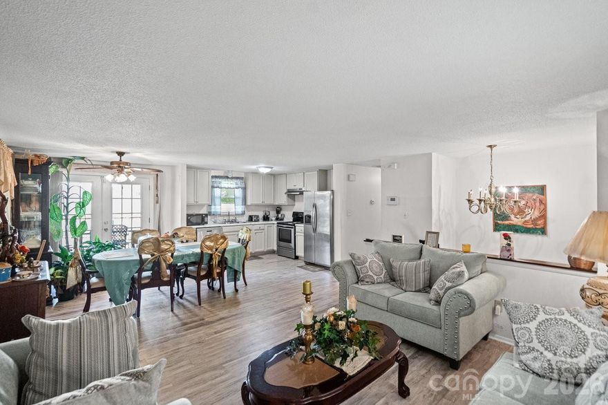 If you’ve been searching for a property that offers both comfortable everyday living and the opportunity for extra income with no HOA, this one checks all the boxes.
Full of charm and ideally located near shopping, dining, and outdoor activities, this corner-lot home gives you the freedom and flexibility today’s buyers want. Inside, the split-level design creates two distinct living spaces, making it perfect for homeowners looking to offset their mortgage or accommodate extended family.
The main level features two spacious bedrooms and a bright, open layout that connects the family room, updated kitchen, and dining area which are ideal for both daily living and entertaining. Step out onto the deck and enjoy easy gatherings or quiet evenings at home.
Downstairs, the lower level opens up even more possibilities. With its own living area, third bedroom, and full bath, it’s perfectly suited for a private guest suite, long-term rental, or separate living quarters giving you the ability to live comfortably while generating additional income.
Major updates include a newer HVAC system (just 5 years old) and a roof less than 8 years old, offering peace of mind for years to come.