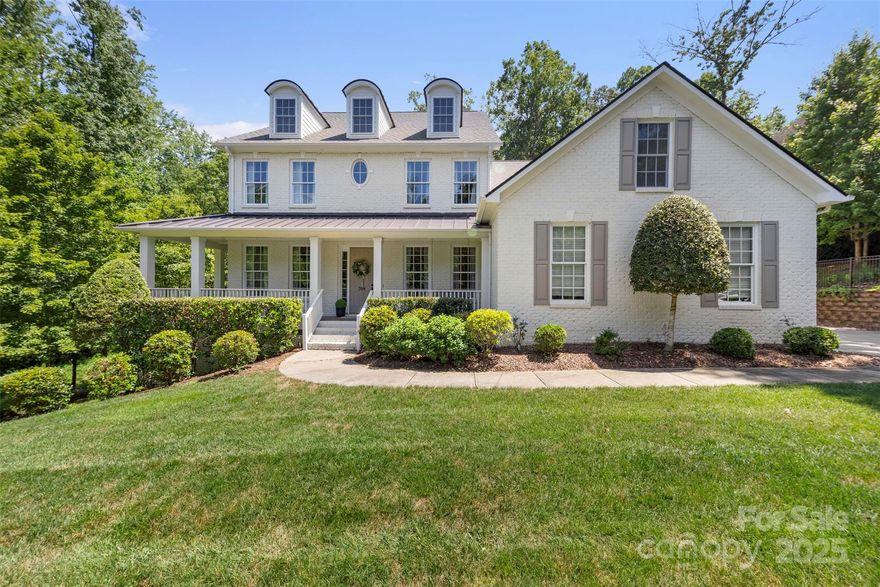 This light & airy home offers 6 bedrooms, 4 with en suite bathrooms & 5 with walk-in closets, 5.5 bathrooms, and 5,983 square feet of living space. Step inside to the main level offering natural hardwood floors, recessed lighting, 10 ft ceilings, and a large kitchen featuring stainless steel appliances, tons of counter/cupboard space, subway tile backsplash, wooden cabinetry, and a huge island as the centerpiece. Step outside to the huge screened in porch with large backyard, an outdoor kitchen, fire pit, hot tub, and fireplace! This level also hosts the primary bed & bath, living room, office, dining room & laundry room. On the 3rd floor you'll find 4 spacious bedrooms & a playroom. The fully finished walk-out basement offers a movie room, workout area, and also has another bedroom with full bath! Just minutes away from Marvin Schools and Firethorne Country Club, and enjoy easy access to Ballantyne Bowl and Blakeney, this home is in a perfect location, schedule your showing today!