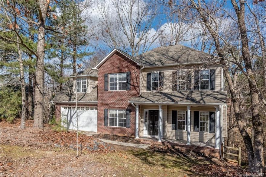 A short drive from Charlotte and Fort Mill, home offers tranquil, private, wooded setting near Lake Wylie's 13 miles of shoreline. Home features nice entertaining space: spacious living room, formal dining room, sun room on main level and finished basement with screened porch. Second floor offers three bedrooms, including master suite, bonus room, laundry. Remodeled kitchen with granite, stainless steel appliances; mud room. Well-established Seven Coves community has no HOA or HOA fees.