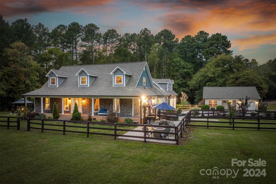 Discover your private sanctuary with this stunning 3-bed, 2.5-bath home nestled on 11 flat acres. Ideal for horse enthusiasts, this property boasts a spacious barn with 5 horse stalls and scenic trails throughout. The charming 2-bed, 2-bath guest house offers privacy and comfort for family or guest. The home itself is a masterpiece of design and comfort, featuring custom finishes throughout. The kitchen has granite countertops, high-end appliances, and ample storage space. The open-concept living area is perfect for entertaining. The primary bedroom is a luxurious retreat, complete with 2 spacious walk-in closets. The primary bathroom is adorned with custom finishes, providing a spa-like experience with a Jacuzzi tub and a walk in shower. A loft above the 2-car garage is perfect for guest space. Outside, enjoy a pool and cabana, ideal for summer gatherings and relaxation. The property also includes two perked lots in the back, ready for future development or expansion.