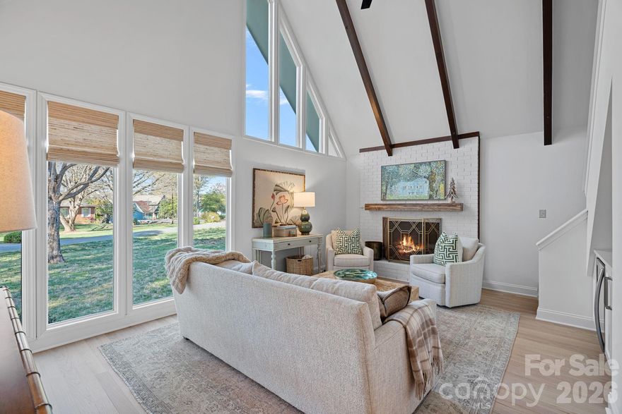 Not all Lake Norman homes need to be waterfront to capture your attention. Welcome to 109 Sandy Shore Drive—a private, beautifully updated little jewel box tucked within the desirable Isle of Pines peninsula offering year round water views, community lake access, and a setting that feels so special. This thoughtfully updated 3 BR 2 BA home features a light-filled interior, stylish finishes, and a seamless flow designed for effortless living. The kitchen and main living spaces are elevated and inviting featuring hardwood floors throughout, designer lighting, a stunning great room with vaulted beamed ceiling, custom wet bar with wine refrigerator, brick fireplace with gas logs and a fully remodeled kitchen with island and 6 burner gas range with vented hood. Upper level loft and large bonus room provide versatile spaces ideal for home office, recreation or a fun bunk room. This property offers exceptional privacy and room to unwind or entertain year round on your expansive pavered terrace complete with fire pit area and hot tub. New shed just constructed on concrete pad for clean dry storage, bikes or garden equipment. Enjoy the best of lake living—kayaking, boating, lake access, and a scenic surrounding—without the upkeep of full waterfront ownership. A rare find for buyers seeking charm, privacy, and lifestyle in one of Lake Norman’s most desirable settings with No HOA.