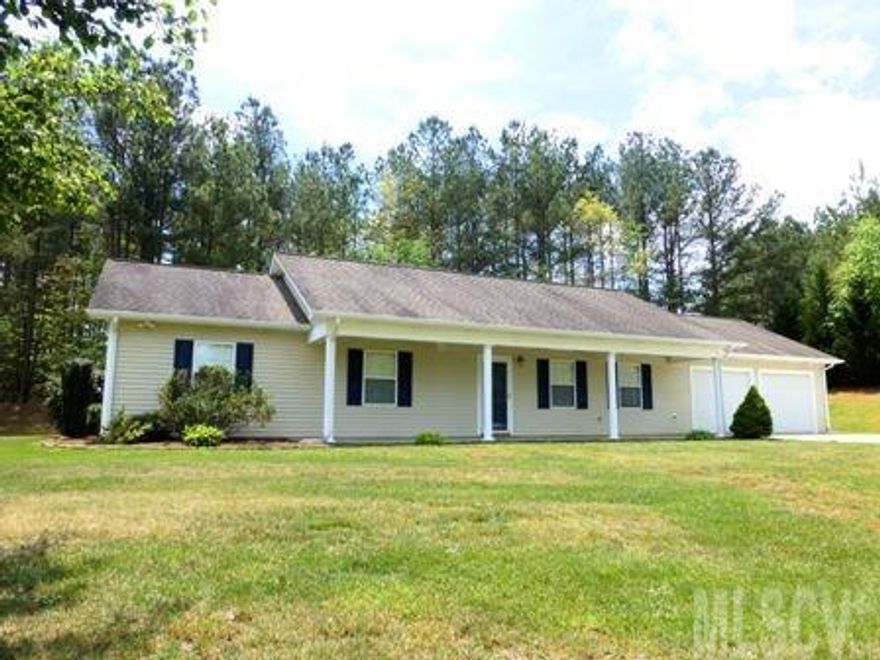 Bring your pickiest buyers! Immaculately maintained 3BR/2BA home on a spacious corner lot. Laminate "wood" floors throughout main areas, tile in both baths & kitchen, carpet in the BR's. OPEN FLOORPLAN! Greatroom boasts vaulted ceilings & a rock gas log FP.  The great room opens up to a spacious dining area & a neutral clean kitchen with lots of cabinets & white appliances. French doors off dining area lead to a private back yard/patio area. Master BR includes a nice private bath with tub/shower combo & a huge walk-in closet. 2 additional bedrooms. Oversized double garage includes laundry hk-ups, painted concrete flooring to give it an even cleaner feel--laundry hook-ups in garage. Luscious landscaping & yard. Rocking chair front porch has 2 ceiling fans to sit & relax.  This home has been well cared for and will sell fast! Taxes-- approx. $920.91.