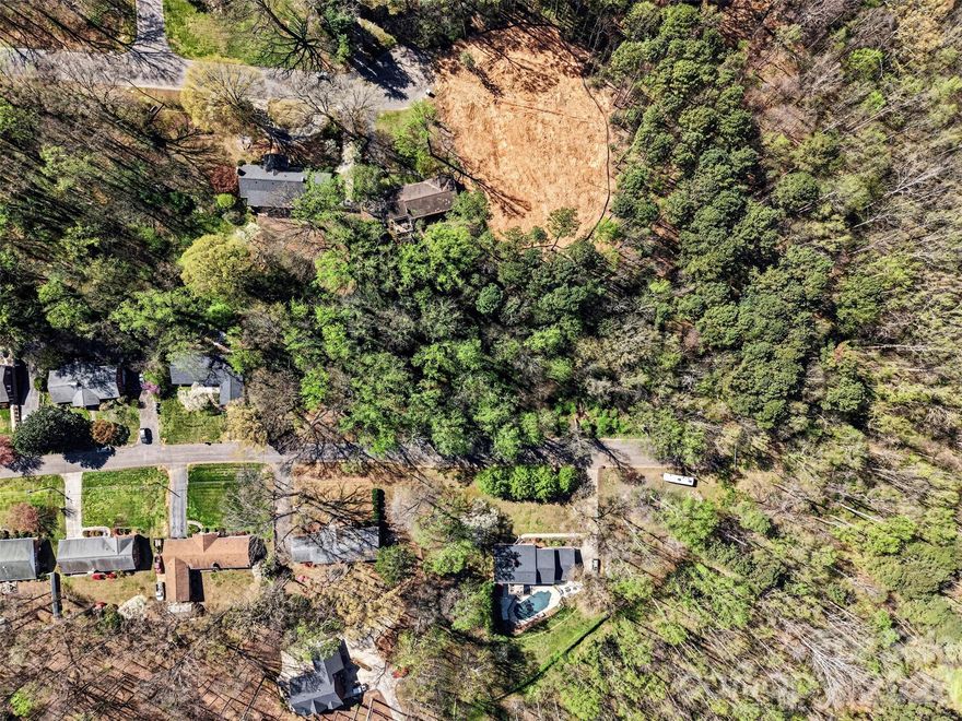 Prime Residential Lot Opportunity in Desirable Statesville Neighborhood! The topography is difficult and not all builders will be able to proceed so please make sure you go to the lot. Don’t miss this special opportunity to own a residential lot in a sought-after location near downtown Statesville! Perfectly situated on a dead-end street on Berkshire Dr, this lot offers a serene setting with minimal traffic. A fantastic opportunity for builders and investors, this lot is ready just in time for the spring market! With easy access to local amenities, schools, shopping, and major highways, this location offers convenience and value. Whether you’re looking to build for yourself or develop for resale, this lot provides endless potential. Act now—call today for more details!