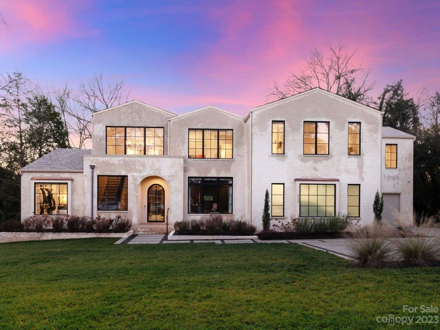 Stunning like new construction home in highly sought after Mammoth Oaks that is move-in ready!  Walking distance to Providence Day School, shops and restaurants.  This beautiful transitional style home is filled with natural light throughout.  All new state of the art home automation system controlled by an app that operate lights, garages, back door, cameras, built in-speakers, tv's and more.  Oversized 3-car garage was upgraded with custom apoxy finished floors and Shade Store window treatments.  Wall mounted tv's will be included with acceptable offer.  Flex office/guest suite on the main perfect for multi-generational living, large primary suite with oversized spa like bath and primary closet that includes laundry hook-up.  3 large guest suites up all ensuite and two large bonus rooms, including a large storage closet and oversized laundry room.  Great outdoor covered entertainment space with fireplace overlooking private backyard, ready for a pool!  Agent is related to seller