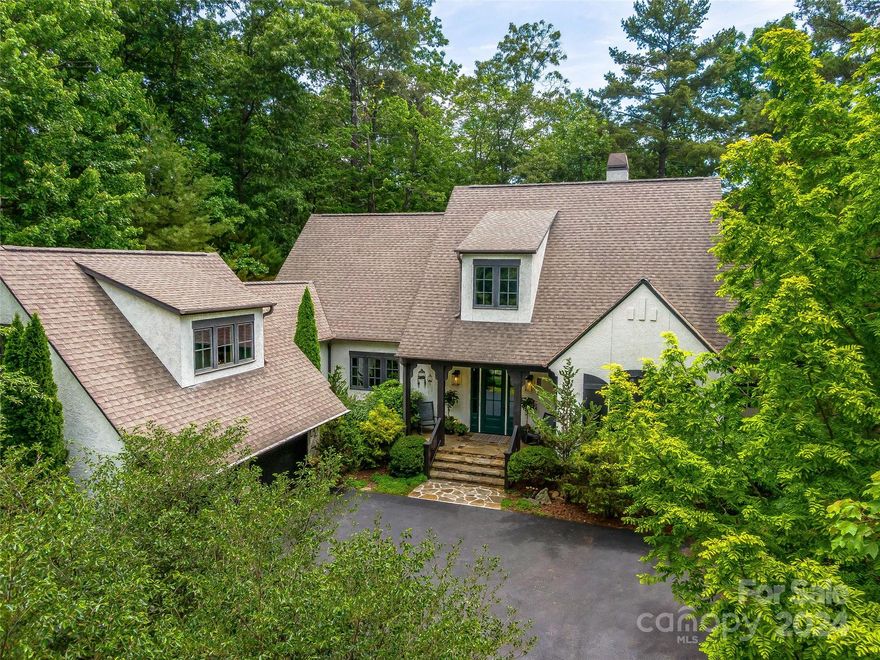 Unique, sophisticated and relaxed describes this thoughtfully newly designed home. Main level living & open floorplan allow the Organic Maximalist style to dance from room to room. Upon entering you are greeted by a wall of windows w/views of lush greens & private woodland landscape. The complete kitchen remodel offers custom lighting, fine cabinets, wine fridge, quartz countertops, new sink & hardware and expanded island. The updated serene, moody study invites pensive moments and inspiration. The entire main level features newly refinished Cherry floors revealing a light airy wood grain throughout. Step into the primary suite & experience soothing elegance, a spacious en-suite and walk-in closet w/a lovely French door leading to the backyard sanctuary! Enjoy outdoor living w/the newly expanded deck, jacuzzi & firepit all embraced by natural Mountain beauty. The Ramble boasts a community saline pool, Living Well Center, delightful concerts in the park and meandering walking trails.