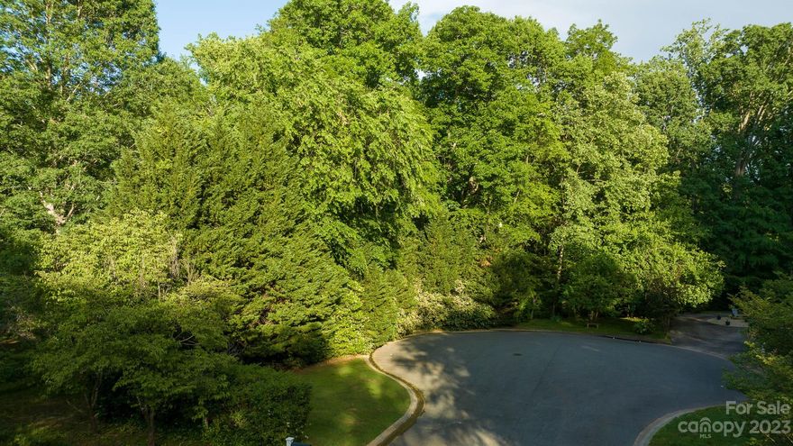 Build your forever home on this fantastic lot in a cul-de-sac with nearly half an acre in Huntington Subdivision. This wooded lot features a creek as well as loads of privacy and it is the last lot in the subdivision! Water and electric hookups are currently on the lot. Sewer is available with tap fee. Convenient location with easy access to shopping, dining and medical facilities!