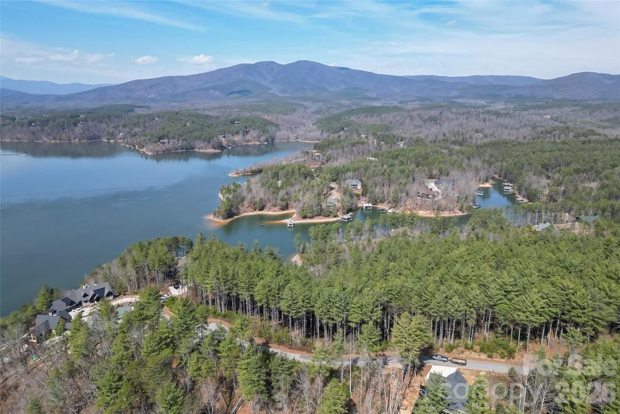 It’s all about the views! Build your waterfront dream home or lakeside retreat in The Peninsula at Lake James, a premier gated mountain lake community.

This 1.80-acre waterfront homesite features a gentle slope and offers breathtaking, million-dollar views of the Blue Ridge Mountains and the pristine waters of Lake James—an ideal setting for your custom mountain getaway.

Residents of The Peninsula enjoy exceptional community amenities, including a saltwater pool, pavilion, fire pit, community day dock, and boat storage. The neighborhood is continuing to grow, with beautiful custom homes currently under construction throughout the community.

Waterfront opportunities on Lake James are becoming increasingly rare, and properties in this sought-after area are selling quickly—don’t miss your chance to own a piece of this incredible mountain lake lifestyle.

Conveniently located less than an hour from Asheville and Black Mountain, the area also offers endless outdoor recreation. Explore nearby hiking destinations such as Table Rock, Shortoff Mountain, and Linville Gorge, or enjoy biking and hiking at Fonta Flora Trails and Lake James State Park. Spend your days on the water boating, fishing, and taking in the natural beauty that makes Lake James so special.

Short-term rentals are allowed, offering excellent flexibility for personal use or investment potential.