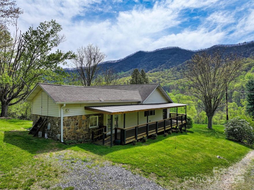 Beautiful Price Improvement on Beautiful Land in Leicester: Family compound, horse farm, homestead, glamping venue, STRs: the possibilities are numerous. The acreage has several potential homesites with views, pastureland, wooded areas, and a stream. The home offers the perfect place to live, rent, or occupy while you build your dream home with more expansive views further up on the property, or use the home as an office for your business venue. 3 bedrooms, 2 full baths, a large kitchen, bonus/dining room, and a large living area with a gas fireplace give you space and comfort whatever your plans may be. The stone canning room adds character and could easily be converted into wine storage. And the covered front porch invites everyone to sit a spell. Conveniently located 20 minutes to downtown Asheville, 7 miles to I-40, and approx. 25 minutes to Waynesville.