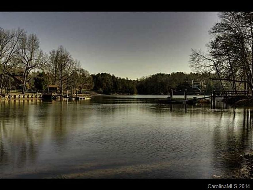 What an opportunity to build your custom waterfront home on a large estate-sized lot in Fort Mill! Privacy and natural beauty are yours with this rare offering. Gorgeous hardwood trees, quiet living and lots of wildlife to watch and enjoy. Bring your own builder. Convenient to uptown Charlotte and located in the excellent Fort Mill School District. Low York County taxes. Dock Permit Available.