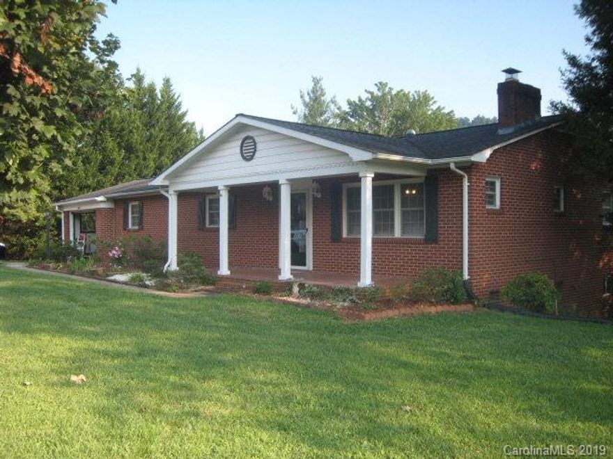 MOTIVATED SELLER....PRICE REDUCTION!!!  Nice Brick Ranch Home on approx. 0.99 acre sized lot. Home is within minutes of I-40 access, Downtown Shopping, Dining, Hospital, and Schools. Large Kitchen with GRANITE counter tops, Gas Range Cooktop, Built-in Microwave, Dishwasher, Oven and Refrigerator. Living Room with built in bookcases surrounding a Brick Fireplace with GAS logs. Oak Hardwood flooring in LR and Bedrooms. Updated Baths, Full-sized Unfinished Basement and attached Single-Car Garage. Peaceful fenced in Patio area ;In-Ground 18 x 36 Pool to enjoy. Pecan tree, Grape vines, Blueberry bushes and many more outdoor treats to discover. Garden space for growing all the seasonal vegetables you can enjoy. Utility Buildings for outdoor equipment and / or recreational sporting equipment.