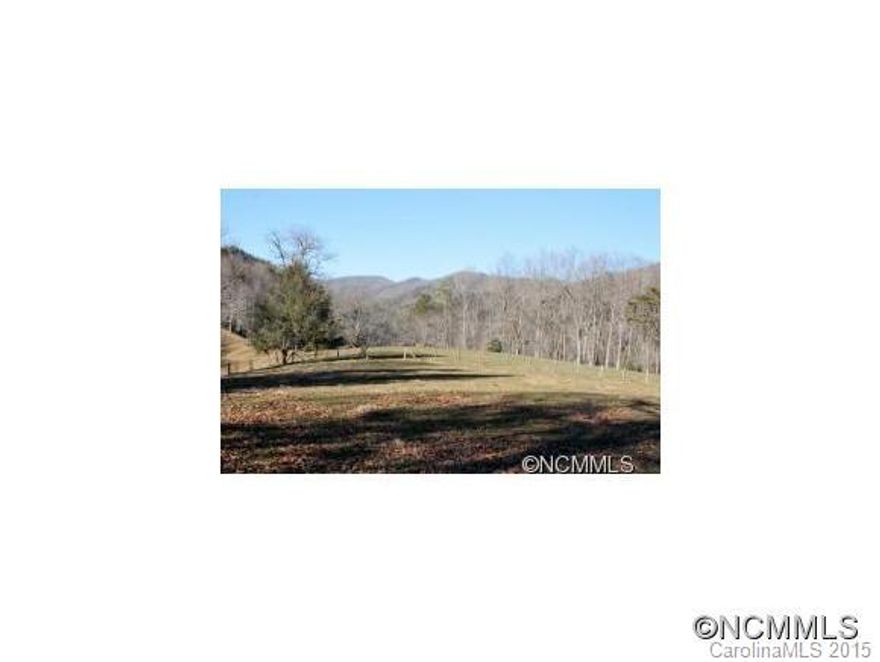 This beautiful UNRESTRICTED 1.96 acres offers plenty of room for a yard, garden and large house site with beautiful mountain views. Enjoy the country life listening to the cattle in the adjoining pasture! Located approx. 5 minutes from town, yet far enough in the country!