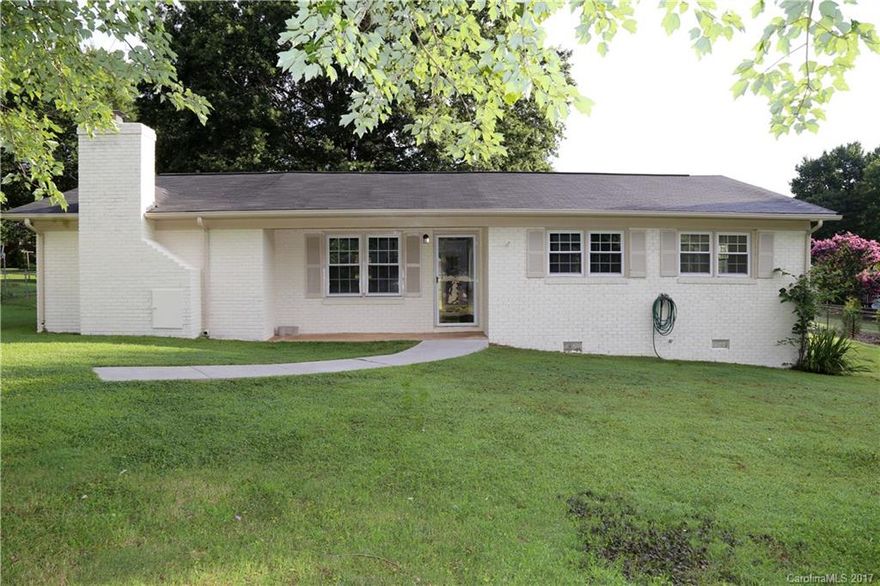 Gorgeous, LIKE NEW home close to I-77 and I-40. This home offers modern convenience with over 1500 square feet of open living space, new roof in 2017, new stainless steel appliances, new fixtures, new windows, new cabinets, new flooring and granite countertops throughout. Enjoy the fenced in back yard and new deck or take a seat on the covered front porch and relax in this peaceful neighborhood with no HOA. This home is ready for a new owner. Come make this lovely house your new home.