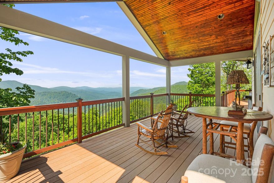Welcome to 197 Cherry Knob, a mountaintop masterpiece in the prestigious, gated Wolf Laurel community, where luxury and comfort meet in a 5,300 acre natural sanctuary, surrounded by the Pisgah National Forest, SE Trust Land and the Mars Hill Watershed. This custom-designed retreat offers an open-concept layout with sweeping long-range mountain views from nearly every room. Designed for effortless everyday living, the main level features three spacious bedrooms, each with its own ensuite bath, providing privacy and refinement for residents and guests alike. The light-filled great room flows onto a full-length deck, ideal for entertaining, dining al fresco, or quiet mornings above the clouds. An elevator connects all levels, leading to a lower-level haven with stylish bar and wine cellar, a second primary suite with lavish ensuite and generous walk-in closet, plus a dedicated office with custom built-ins and full bath. Home offered turn key.
Set in Wolf Laurel, residents enjoy a true four-season lifestyle surrounded by cool high-elevation air, protected mountain vistas, and abundant recreation. Optional Village Club membership provides access to the pool, sports courts, pickleball, tennis, playground, outdoor pavilion, stocked trout pond, and event center. Optional Wolf Laurel Country Club membership adds an acclaimed 5-star golf course, 24-hour fitness center, restaurant, and bar. Enjoy 50 miles of internal hiking trails, or step onto the Appalachian Trail from multiple community access points. Be sure to take advantage of the new Hatley Ski Resort with year-round dining at Smoke & Timber and a downhill bike park slated for spring 2026. Everyday conveniences can be found close by in the nearby towns of Mars Hill (15 minutes), Weaverville (25 minutes), Burnsville (20 minutes) Asheville (45 minutes), and Johnson City, TN (45 minutes). Both with regional airports. Come see why they call us the Jewel of the Blue Ridge Mountain.
***This home is located within The Ridges HOA governance which does not allow short or long term rentals***