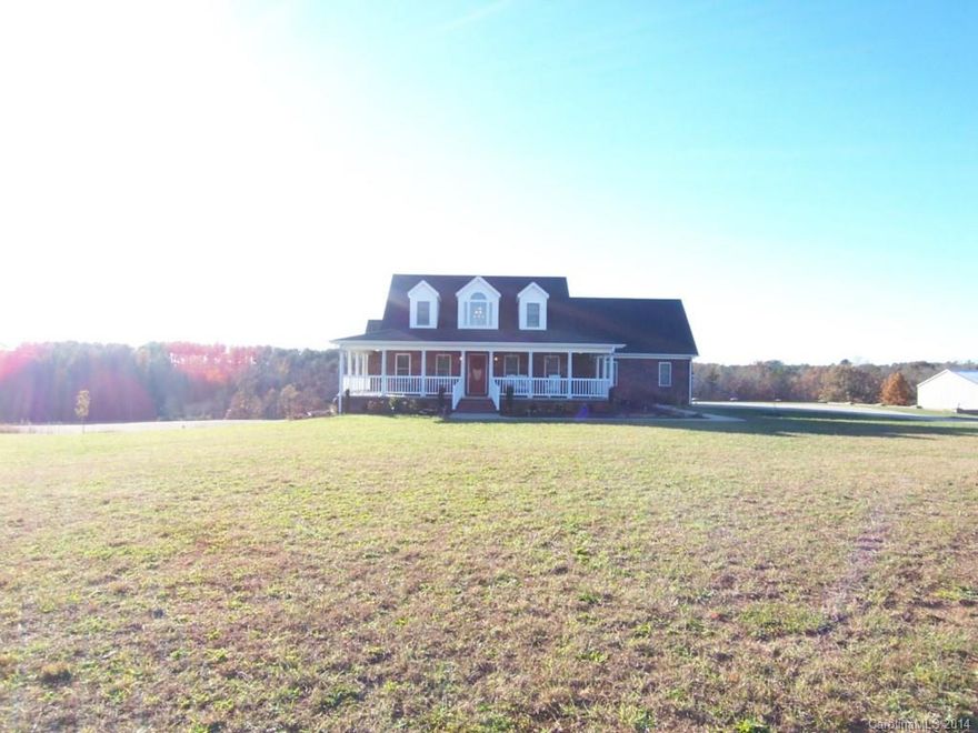 Approximately 10.55 acres surround this home with in-law quarters plus detached 30x40 garage. Unfinished bonus room, formal dining, kitchen with gas cooktop, oven with warming drawer, patio, wrap around porch and deck.  Oversize master shower.  Drip line irrigation in front beds.