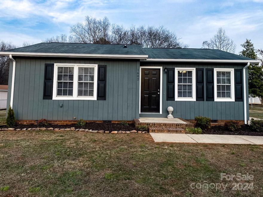 Welcome to this adorable home located in the highly desirable Mountain View area off of River Rd. Nestled in a serene cul-de-sac, sits a charming modern ranch home. Bathed in natural light, its spacious interior boasts taller ceilings and an inviting open floor plan, which is practical and aesthetically pleasing. This  spacious 2 bedroom, 1 bathroom home has been completely remodeled with new shutters, gutters, LVP flooring, countertops, heat pump and water heater. As you step outside, discover a great sized backyard, perfect for both leisure and play, where one can run freely or lounge in hammocks. Location is prime as you are right around the corner from 321 and 10 minutes from downtown Hickory! Also, there are NO city taxes. Book your showings today!