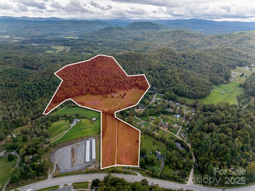 Discover the perfect blend of peaceful country living and convenient access to Asheville, Brevard, and Hendersonville. Six parcels make up this multi generational 59 +/- acre parcel.  It is just minutes from the Turkey Pen entrance of Pisgah National Forest—an outdoor lover’s paradise with hiking, horseback riding, and mountain biking right at your doorstep. Approximately 20+ acres are gentle and level terrain. Whether you're envisioning a private estate, equestrian retreat, or working farm, this land offers the freedom to bring your vision to life. Enrolled in both the Wildlife Conservation Land Program and the Present-Use Value Program, the property also provides valuable tax deferment benefits. At its center sits a well-maintained brick ranch home, surrounded by open fields perfect for grazing, riding, or future home sites. A peaceful pond adds to the charm, offering a serene place to unwind and soak in the natural beauty. Multiple potential building sites. Ideal for a family estate or homesteading and farming.