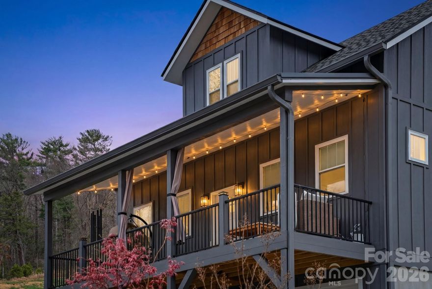 This is what “I don’t want to leave” feels like.
At 16 Hare Ridge Road, outdoor living takes center stage. Set on a private one-acre lot in Asheville, this modern 3-bedroom, 2.5-bath home with a flexible bonus space blends clean design with the kind of indoor-outdoor lifestyle you searching for.

Start your mornings on the covered front porch, spend your afternoons on the expansive back deck, and wind down at the fire pit under the open sky. With a fenced yard and multiple outdoor living spaces, this home is built for entertaining, relaxing, and making the most of a peaceful, private setting.

Inside, the open floor plan creates an easy, natural flow between the kitchen and living area. The kitchen features quartz countertops, Bosch stainless appliances, an induction cooktop, and a large island with seating designed for both daily living and gathering. The gas fireplace anchors the living space with warmth and modern style.

The main-level primary suite, along with laundry and a half bath, offers true main-level living for comfort and convenience. Upstairs, two additional bedrooms, a loft-style sitting area with built-ins, and a versatile flex space provide room for a home office, guests, or a quiet retreat.

A two-car garage basement adds valuable storage, completing a move-in ready modern home that delivers space to entertain, thoughtful design, and a location that keeps you close to everything Asheville has to offer.

Private. Functional. Designed for the way you actually want to live, inside and out.