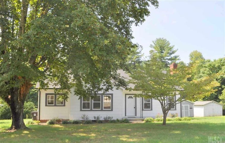 Walk down the cobblestone pathway to this charming 1950's renovated home on almost 1.5 acres in Valdese. With over 1200 heated feet this home features 2 bedrooms and 1 renovated full bath, large dine in kitchen with lots of cabinet space, new counter tops, dishwasher, range to be provided and breakfast bar. Formal dining room with lots of windows bring in loads of natural light .  Living room is complemented by the wood burning fireplace.  Fresh paint and refinished hardwoods throughout the home. Additional updates include new roof with architectural shingles, new replacement windows, new gutters, new vinyl and metal trim, new flooring, and light fixtures.  This is like a brand new home with all the updates! Don't miss this great buy!!!