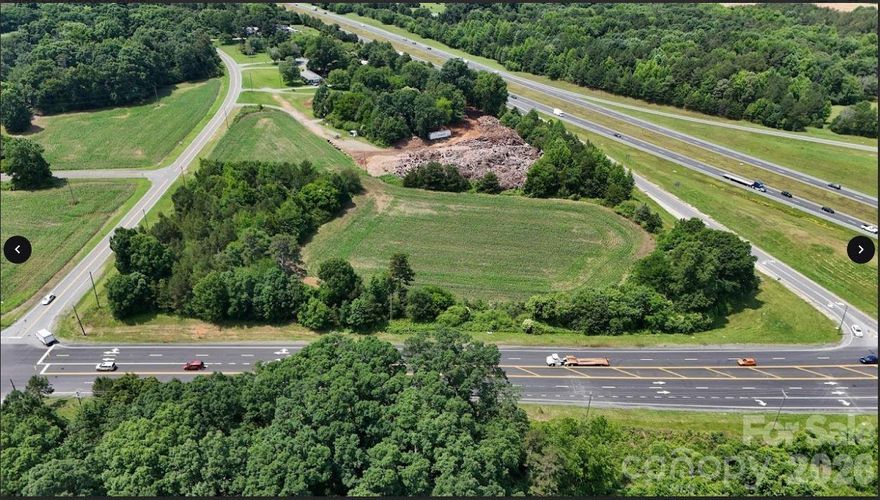 I-485 and Hwy 218 (Mint Hill Exit). Near Traffic light at Brief Rd and Allen Black Rd side. See Mint Hill Town Zoning map for possible rezoning options. Can be rezoned for Retail and Office. No convenience stores/gas stations!Call broker to discuss. This property would have access from Hwy 218. More land possibly available. Another corner available 4.41 ac across Hwy 218 on the Brief Rd side. City water available.