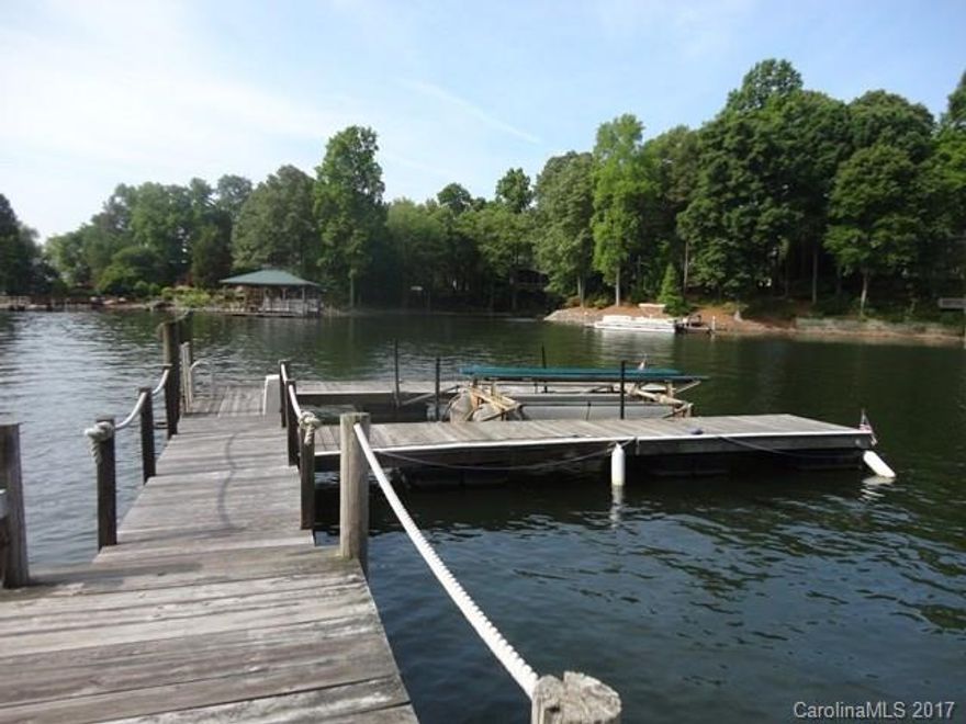 WATERFRONT RANCH with Basement home on Lake Norman! Huge Great Room with stone fireplace overlooks the lake with panoramic views and Deck access, Kitchen has stainless appliances, Pantry & Breakfast, Formal Dining, 3 Bedrooms including Master Suite with garden tub and access to Deck with water views. Finished Basement has Bonus Room, Full Bath and access to backyard via Patio. Enjoy boating on the lake from your own Pier with Boatslip. No Smoking and 1 Pet under 40-lbs conditional with pet fee.