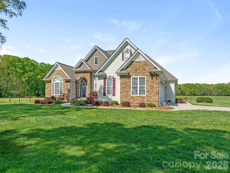 Charming 40-Acre Farm with Spacious Ranch Home! Escape to the serenity of country living with this stunning farm, featuring a beautifully maintained ranch-style home. This picturesque property offers endless possibilities for farming, livestock, or recreational use. The 3-bedroom ranch home with office boasts an open-concept layout, with soaring ceilings throughout and an upstairs bonus/flex room. The spacious great room features a cozy fireplace and the well-appointed kitchen features a breakfast area that invites breathtaking views of the countryside. Home includes lovely screened porch and ample storage. The property includes approximately 20 acres of fenced pastures, a 2-stall barn & large workshop perfect for horses, cattle, or hobby farming. Close to everything, located only 15 minutes from I-485 & Mint Hill, this property offers the perfect blend of privacy & convenience. Whether you dream of equestrian pursuits, farming or simply a tranquil retreat, this property is a must-see!