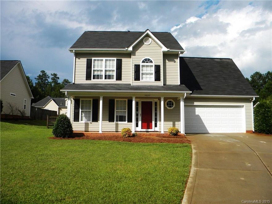 PRICED TO SELL.  MUST SEE!  MOVE IN READY!  Covered front porch to watch the world go by.  Charming, two story home on corner lot with fenced in back yard and patio.  Large, open family room with gas logs.  Large dining area.  Cook in the amazing kitchen while watching your favorite show.  Refrigerator to convey.  Vaulted master bdrm w/ ceiling fan and large walk-in closet. Garden tub/Sep shower master bath.  Additional 3 bedrooms/bonus.