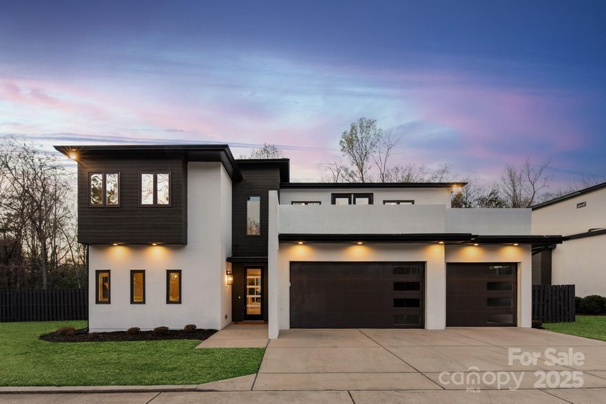 2019 custom contemporary home w/ 3 car garage & 1/2 acre usable yard. Light & bright interior w/ white oak floors, neutral paint and designer light fixtures! Open floor plan features a foyer w/ floating staircase, primary bedroom on main + private study.  Kitchen includes a large 9 foot quartz island w/ waterfall edge, 48inch commercial gas range w/ double ovens & 6 gas burners + commercial hood, drawer microwave, new fridge + large walk in pantry. Great Room features a ribbon gas fireplace w/ contemporary tile clad surround to ceiling. Primary bath includes oversized zero entry spa shower & vessel tub, floating cabinetry w/ quartz tops & under cabinet floor lighting + spacious custom walk in closet. Upstairs includes 3 secondary rooms, 2 secondary baths, a loft area + a separate bonus room. Take in the great NC weather from the roof top terrace or the oversized deck with gas fireplace. Other features include a fully fenced backyard, in-ground irrigation, security system and No HOA!