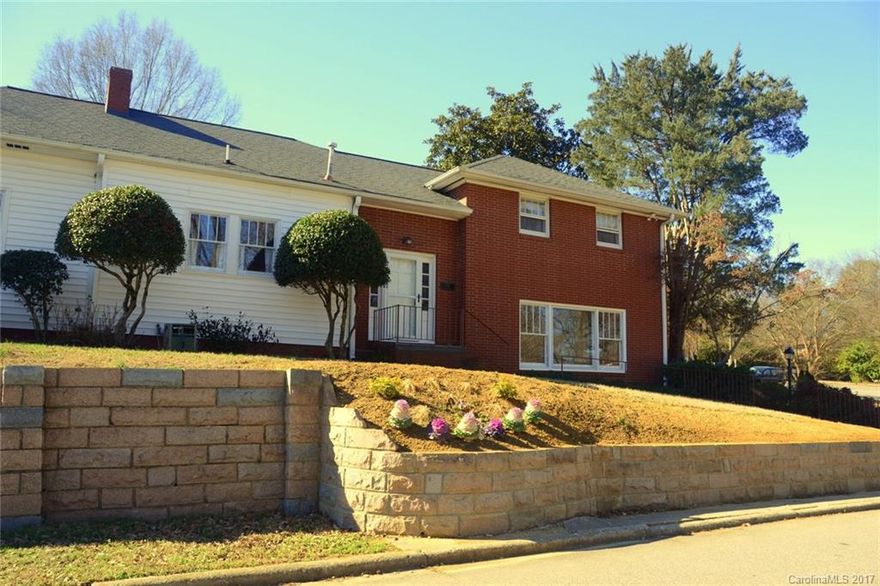 Bring Buyers - UPDATES inside & out! 1-year Home Warranty! Renovated Kitchen w/top-of-the-line Stainless Steel appl's w/Refrigerator included! Master & Guest Baths refreshed! Pristine hardwoods, Den is 17x13 - you decide if it's a game room, office, etc. Built-ins and FP add character to Living Room! Sunroom enjoyed year-round! New Retaining Wall. Central Vac. Water Heater 2015 (digital). Home in fantastic location - park across the way has  playground, tennis courts, Summer movie nights, etc.