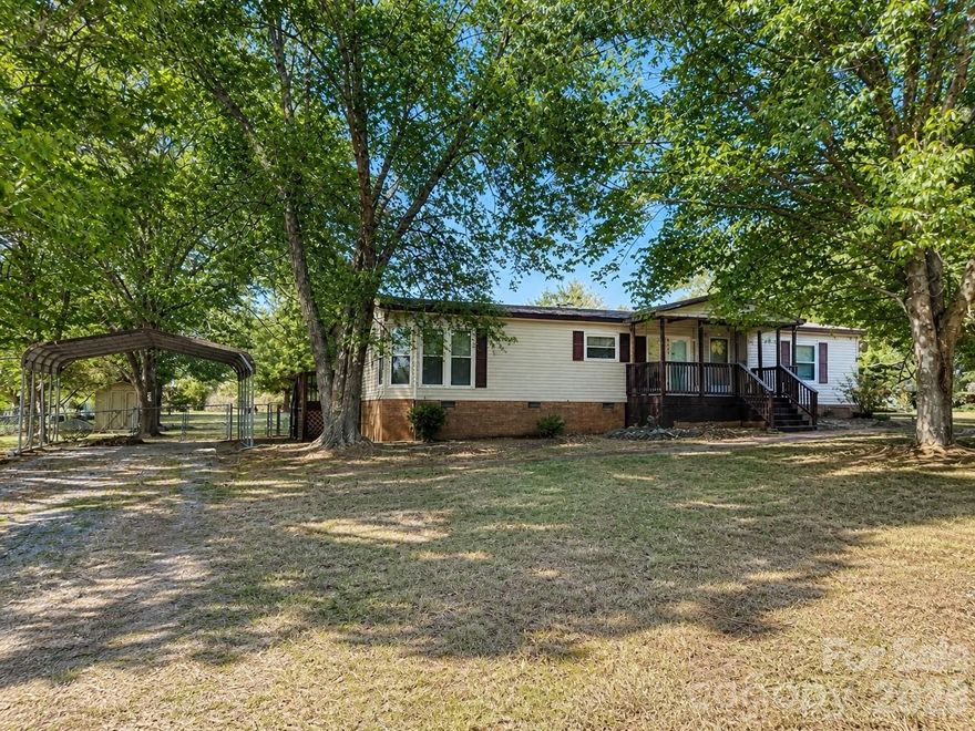 If you’ve been looking for space, privacy, and potential without breaking the budget—this is it.

Situated on just under an acre (.99 acres) with no HOA and only county taxes, this property offers a rare amount of land for the price point while still being just minutes from shopping, restaurants, and downtown Monroe.

Inside, you’ll find a split floorplan that provides separation between the primary suite and secondary bedrooms. The kitchen features a bar area that opens to the main living space, creating a natural flow for everyday living and gathering.

Step outside and enjoy a spacious backyard with mature trees and plenty of room to spread out, along with a storage shed for added convenience. The covered front porch adds charm and a great place to relax.

The home is being sold as-is, and the seller has indicated the HVAC system is not currently operational and a window unit works fine. The price reflects this, offering a great opportunity for a buyer ready to make updates and add value.

If you’ve been waiting for a property with land, flexibility, and upside—this is one to see.
