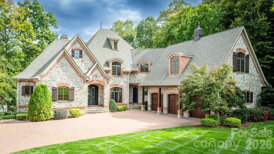 Stunning Custom Built Waterfront Home in The Vineyard At Kiser Island! Whole House Intercom System! Large Primary Bedroom on Main Floor w/Elegant Dome Ceiling & (2) Walk-In Closets, Spa Like Primary Bath w/Soaking Tub, Huge Walk-In Shower & (2) Vanities, Great Room w/2 Story Windows & 2 Story Stone Fireplace Overlooking The Lake, Gourmet Kitchen w/Stainless Appliances, Custom Cabinets & Eat-At Breakfast Island, Elegant Dining Room w/Coffered Ceiling, Office w/Built-Ins, Laundry Room w/Sink & Custom Cabinets Finish Out The Main Floor, 2nd Primary Bedroom Upstairs w/Walk-In Closet & Ensuite Full Bath, Bedroom 3 w/Direct Access to Full Bath, Huge Bonus Area Over Garage, Lower Level Boasts a 3rd Primary Bedroom w/Walk-In Closet & Ensuite Bath, Wet Bar/2nd Kitchen, Wine Cellar, Family Room w/Fireplace & Theatre Room. Fully Fenced Backyard Oasis w/Screened Porch, Stone Terrace, Covered Patio & Pier W/Covered Boat Slip, All With Amazing Wide Cove & Main Channel Views. Excellent Location Close to Shopping, Schools & Restaurants w/Low Catawba County Taxes.
