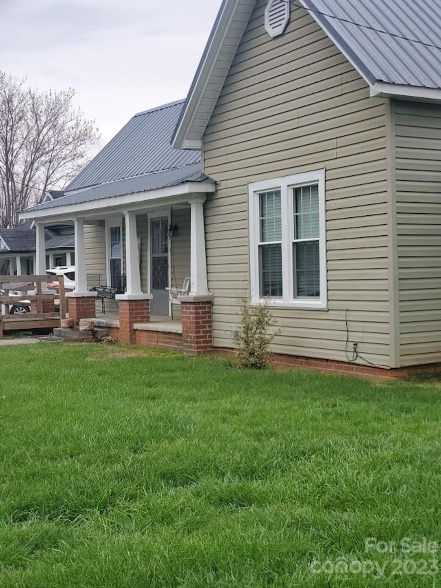 Move in ready, 2 bedrooms 1 bath home on 1 acre.  Freshly painted interior, laminate flooring, metal roof, insulated windows, and is located near Drexel Elementary. $179,900.00