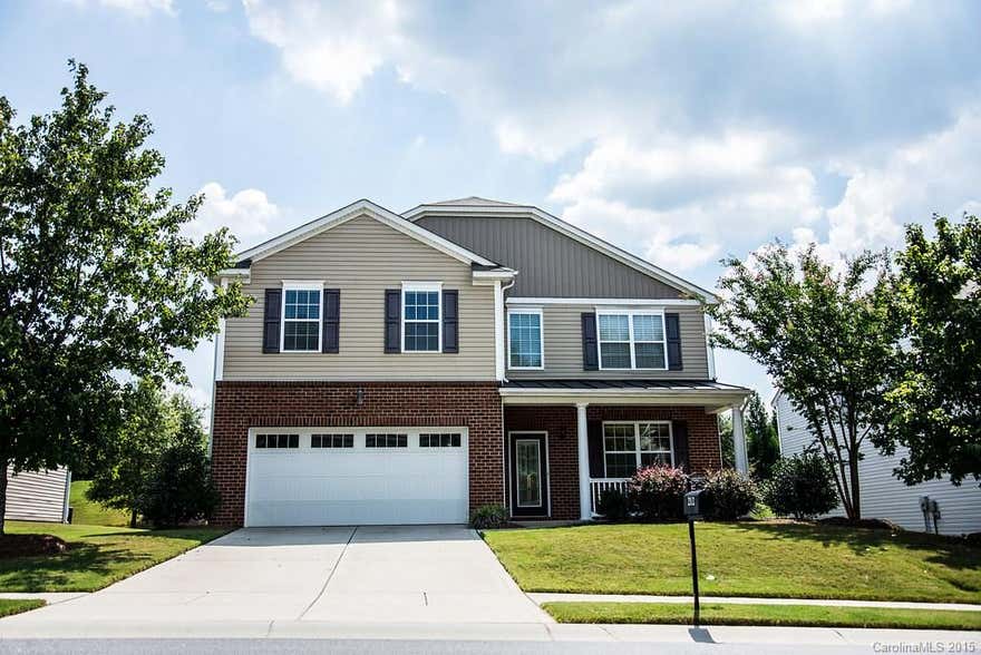 Beautiful home in sought after Fort Mill, SC! 5 bedrooms with guest suite down and just minutes away from I-77! Large kitchen features 42" cabinets, granite counters and SS appliances.  The kitchen is open to the family room with gas log fireplace.  This home boasts a large master BR with spacious walk-in closet, secondary bedrooms have walk-in closets, large laundry room upstairs, and spacious bonus room/media room.