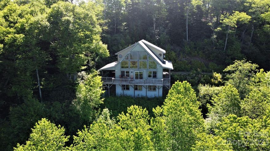Get away from it all at this cabin in the clouds at over 5,000 feet elevation. The views are amazing the privacy unmatched.See for miles over the multi-layered mountain ranges of the Smokies, yet see not one soul as you hike the many trails available to you. There are no homes close to you, you feel like you are by yourselves, free of civilization. You are surrounded by natural beauty. Peace and tranquility will set in quickly. Yet you can be in the town of Cherokee on the Cherokee Indian Reservation in about 20 minutes. There are good supermarkets, movies, craft shops and much more. The is even a huge Harrah's Casino with excellent restaurants. If you like feeling that you are living off the grid, yet having close by amenities, this is the unique place for you.