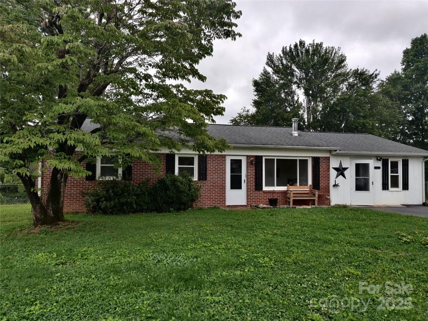 Welcome home to this Charming Remodeled Ranch 3-bedroom, 1-bath brick ranch, perfectly situated in the lovely town of Hudson. Nestled on a spacious lot, this home offers a perfect blend of modern updates and classic charm.

Step inside to discover a brand-new kitchen, updated flooring throughout, and beautifully preserved original hardwood floors that add timeless character. The interior has been freshly painted, and the exterior professionally pressure-washed, making this home truly move-in ready.

Enjoy year-round comfort with a brand-new HVAC system and heat pump. Step out back to a generously sized deck—perfect for entertaining—and a fully fenced backyard, ideal for pets or play. A brand-new storage building adds extra convenience for all your storage needs.
Located in a quiet and friendly neighborhood, this home offers the peaceful setting you’ve been looking for. Whether you're grilling out or enjoying a quiet evening on the deck, this property is ready to welcome you home.