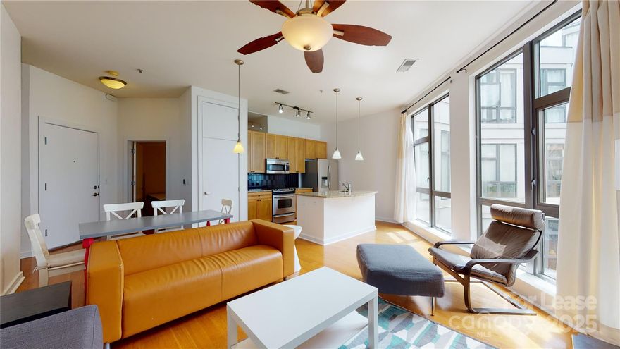 Uptown condo that's perfectly situated just a short walk from First Ward Park, and Lynx light rail line. This condo has a great view and has a wonderful open floor plan. Floor to Ceiling Windows that let in tons of natural light overlooking the courtyard. Primary bedroom with both bathrooms have been remodeled two years ago, with a stackable washer dryer. The kitchen features granite countertop with tile backsplash and stainless steel appliances. Building features a secured entry with gated parking garage! Relaxing courtyard for residents. Enjoy Uptown attractions close by including, Spectrum Center, Museums, Romare Bearden Park, the light rail, and many restaurants and shops! There will be a $75 HOA move in fee which will be tenant's responsibility. Only applications on Property Management website will be considered.
