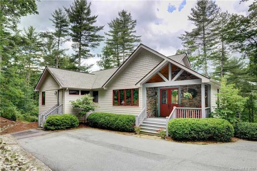 Bright and cheerful 3 BR/2.5 BA home is the perfect place to get away from it all to take in the cool & rejuvenating mountain air. Only 10 min drive from Cashiers. Open flr plan w/lge windows, hardwood flrs, cathedral beamed ceilings, gas FP flanked by blt-ins in LR, bar w/sm refrig, updated kit w/SS appliances, granite counters. Formal & informal dining. Huge master suite on main level w/lge bath & walk-in closet. Screened porch & open deck overlooks 13th fairway of Sapphire Nat'l golf course.