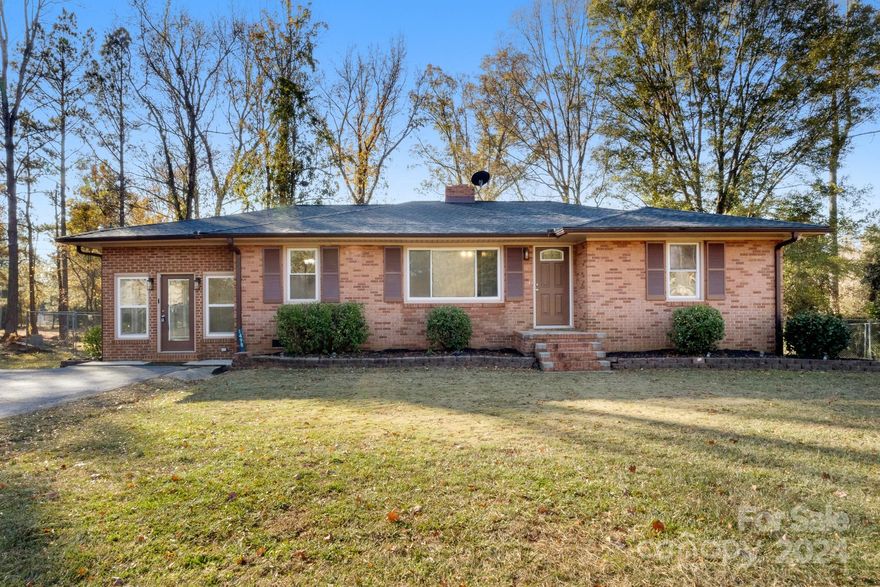 Wonderful Brick Ranch Home on 0.68 ACRES UPDATED and ready for you! Walk onto Designer
LVP Flooring throughout this home. The Great Room is welcoming with natural light and a fireplace. Just around the Corner you have the Kitchen with real Wood Cabinets, Granite Counter-tops, and SS Appliances. Above the sink a pair of windows looks out to the yard. The Kitchen is coupled with the Dining Area. Off of the Dining Area is a Sunroom FILLED with Natural Light throughout and features a Ceiling Fan. The Laundry is located just past this area for your convenience. Primary Bedroom is wonderful featuring a Ceiling fan with Standard Closets. Primary Bath is updated with a Walk-in Shower with Custom Designer Tile. 2 Other Guest beds are wonderful size. Guest Bathroom also boast a Double Designer Vanity with Tub/Shower Combo. The outdoors is lovely with an open backyard and Mature Trees. Enjoy the evenings out back on your spacious Deck. Come see for yourself!