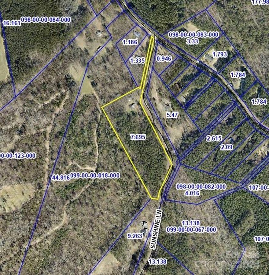 This is a very private 7.7-acre parcel with a small manufactured home on it, which is being sold as is and is of no value.  The property has two sheds on it.  There is a well and septic on the property but the seller does not know the condition.  According to the seller, they worked when the property was last lived in. This is an estate, and the seller is selling it as is with no repairs.  The seller states that, as far as they know, the paved road is maintained by the county.