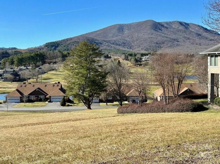 Premier Homesite! Enjoy this amazing view of the community, golf course (partial views) and Mt. Jefferson State Park from the rear deck of your mountain dream home. Jefferson Landing, a gated golf community, w/ 18 hole course, pool/fitness center, pickleball /tennis courts and Riverside Park, adjoining the New River. Coming this spring: Himalayan style putting course & seven par 3 practice holes. $1000 Capital Improvement pd to the JL POA, by the buyer at closing.