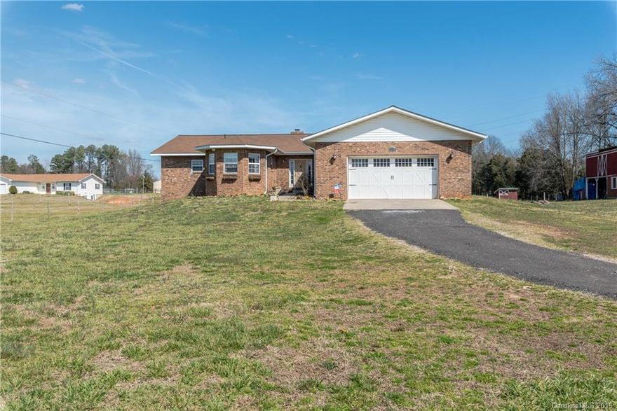 CALLING ALL HORSE LOVERS!!!! This 3/2.5 home sits on a beautiful 5 acre lot equipped with a 2 stall horse barn with tack room and hay loft!  Inside this home features a gorgeous great room with a very nice kitchen/breakfast nook!  Be sure to notice the ceilings in the great room! The wood used on the ceiling is wood that was milled from the very land on which this home sits!  A beautiful master bedroom includes a luxurious en-suite with huge master closet! WAIT UNTIL YOU SEE THIS BASEMENT!!!