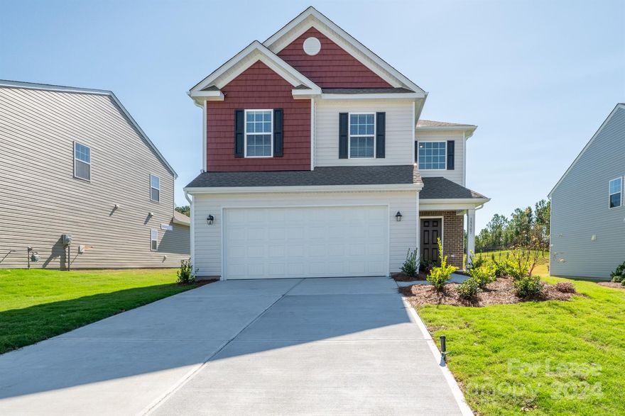 Stunning New Home in desirable Brightwater community located on Grand Palisades Parkway w/4 Bedroom, 2.5 Baths. Home features an amazing gourmet Kitchen w/white cabinetry & quartz countertop, breakfast area. All SS appliances including gas range, dishwasher, microwave, refrigerator & washer/dryer. Open Floor plan gives plenty of room to entertain on the main floor w/Luxury vinyl plank flooring. Family Room w/gas fireplace has mini square windows along wall which let in lovely sunlight. This home comes with blinds thought out. Venture upstairs the Spacious Primary Bedroom Suite & Bath Suite w/dual sinks & large walk-in shower. There are 3 additional bedrooms & a loft area too. Large level backyard w/concrete patio. Smart home features: ring doorbell, Wifi, smart water shutoff & dual thermostat. Enjoy resort like living! Located in The Palisades, close to Carowinds Amusement Park, Lake Wylie, shops, restaurants, highways & 25 minutes to airport & from Charlotte uptown & Ballantyne area.