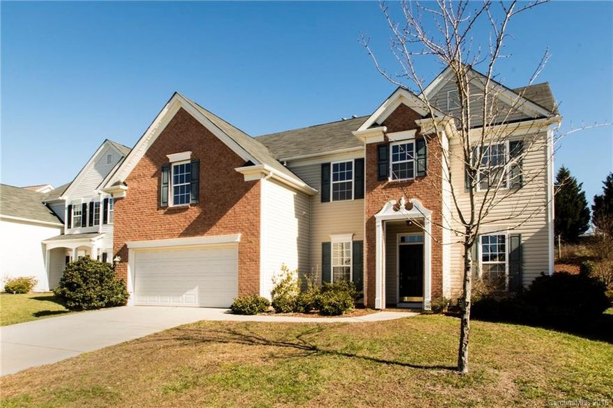 Welcome home!! This is the home you have been waiting for!! Like new- Fresh paint, brand new carpets- clean throughout! This 4 bedroom 2.5 bath plus large bonus room home welcomes you with warm hardwoods throughout.  The large foyer leads you directly to the grand inviting kitchen.  The open kitchen and family room set up is made for entertaining!  Upstairs, the spacious hallway directs you to the bedrooms and over-sized bonus as well as the laundry area! This is a MUST see!