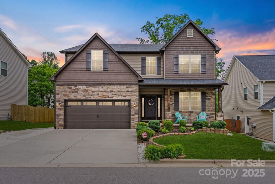 Stunning 5-bed/2.5-bath craftsman-style home nestled in Arden's premier Balsam Ridge. With only 24 meticulously crafted single-family homes, this intimate neighborhood combines modern convenience with comfort. The welcoming covered front porch invites you in, while the back deck is perfect for relaxing or dining al fresco. Main level features impressive open layout, formal dining room, office/den, and versatile guest room with attached half bath. Gourmet kitchen boasts stainless steel appliances, island, walk-in pantry, and breakfast area overlooking the expansive family room —ideal for gatherings. Upstairs, you'll find the primary suite with generous walk-in closet, expansive loft area, 3 guest bedrooms & laundry. Come home to Henbit Way (which safely ends in a cul-de-sac) where the community comes together & still plays outside. Minutes to Biltmore Town Square, AVL Airport, NC Arboretum & Blue Ridge Parkway!