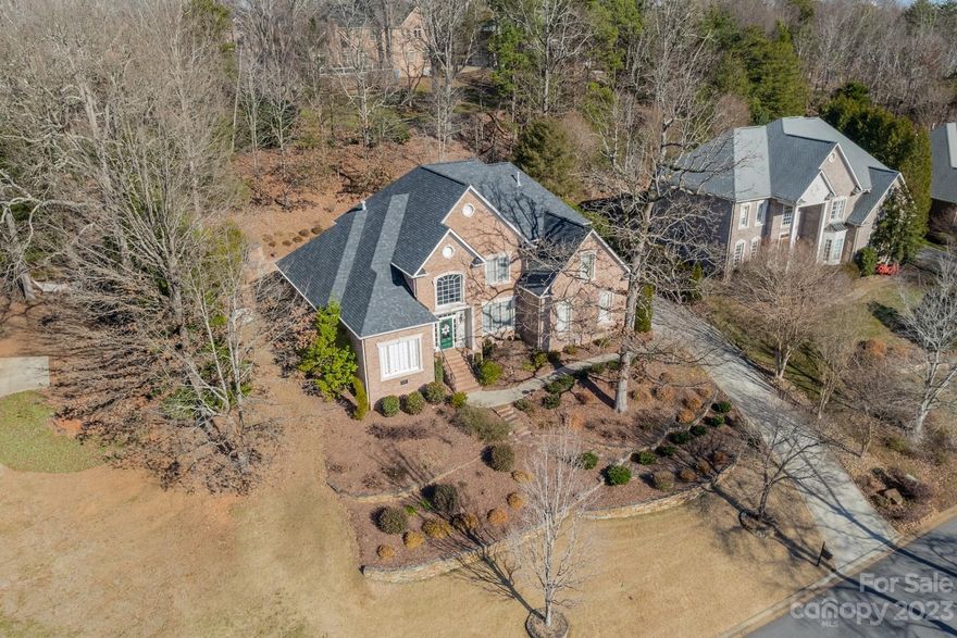 This home has it all! Beautifully updated & landscaped brick home in desirable Bradford Park. Walk into the grand entrance & appreciate the open-concept floor plan with its elevated architectural features & recently refinished floors. Well-appointed primary suite w/dual walk-in closets, plus an office on the main level. Recently updated kitchen w/plenty of countertop & cabinet space; 2-story great room with a gas log fireplace & built-ins. Upstairs, find 3 more spacious bedrooms, along with 2 shared baths & a large bonus room. Outside, the terraced patio living area features plenty of seating space, an outdoor kitchen, a handsome gas log fireplace, plus raised beds for your next herb garden or plantings of your choice. Nice fenced backyard area. Multiple upgrades including a whole home generator, encapsulated crawl space & water filtration system. Meticulously maintained, move-in ready & very convenient to I-485, shopping, restaurants & great schools.