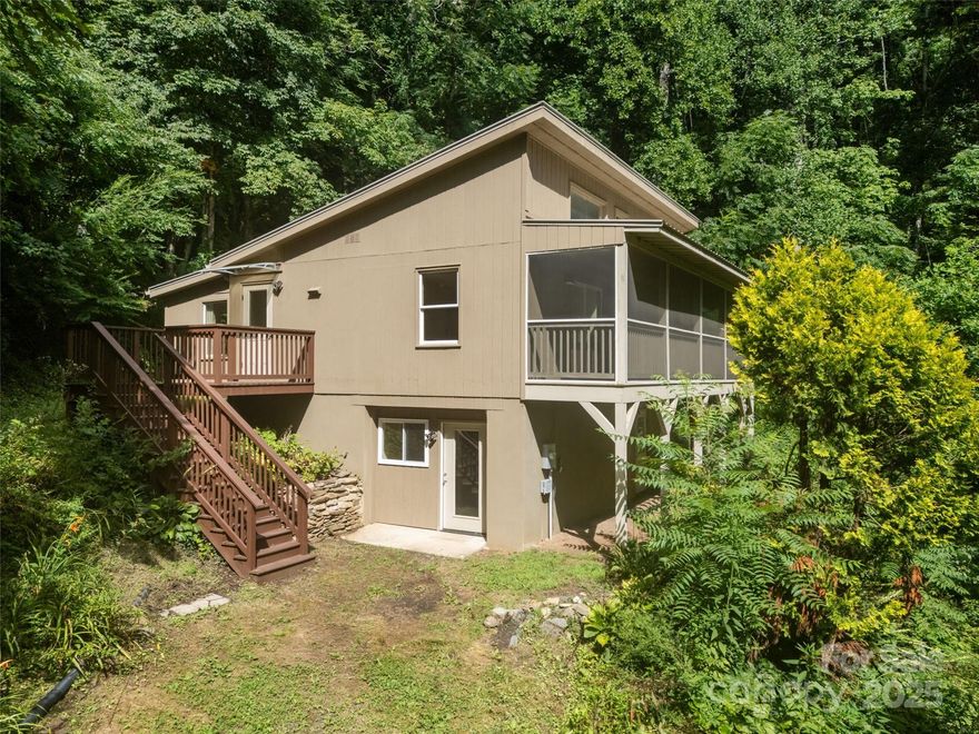 Motivated Seller! This is your chance to claim a rare piece of Western North Carolina— 27.81 +/- acres. Your own riverfront and your own forested mountainside. Nestled in the heart of Swannanoa, this property includes a house perfect for launching your mountain lifestyle. Fish from your own banks, hike your own trails, and watch the sunrise from your own peak. Swannanoa is seeing new life, with growth and energy returning to its roots. Be part of the resurgence while holding one of the most unique parcels in the valley. Seclusion, views, water, elevation—it’s all here. Whether you're looking for a private retreat, future homestead, development or investment in one of the region’s most promising up-and-coming areas, this property checks every box. Don’t miss your shot at mountain living with space to dream big. The heat pump is disconnected so no heat nor air conditioning to validate the HLA Sq Footage.