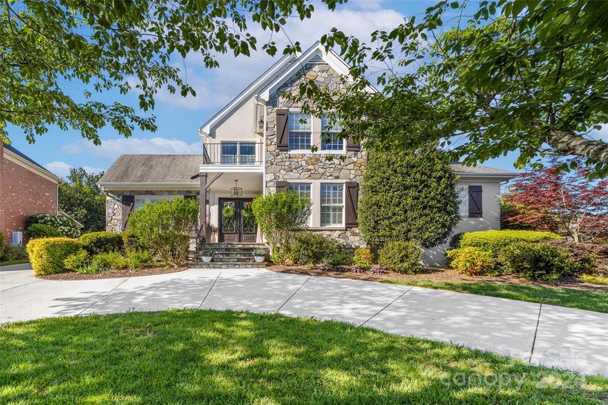 Welcome to your own private farmhouse retreat in the highly coveted Peninsula neighborhood! This home combines modern updates with rustic charm. Inside you will be greeted by the warmth of dark wood floors, exposed beams, and wood barn doors. The open concept ensures flow between the main living areas featuring an elegant fireplace insert and storage nooks. With its generous array of rooms this house presents ample opportunities for versatile space such as a home office and personal gym. The updated first-floor primary bedroom provides a luxurious retreat. On the second floor you will discover a terrace and seating area. For movie nights or sleepovers, the media room with bunk beds creates a cozy and inviting space. Step outside into the expansive backyard, boasting a sprawling porch, charming pergola, and relaxing fire pit area.This home is located in a vibrant community, just a short walk to the golf club with many amenities. It has 2 community docks with a possible option to lease.