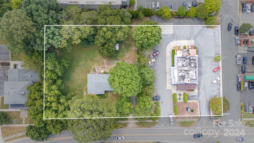 Prime Commercial Property in Matthews, NC  --  Located in the bustling heart of Matthews, this prime commercial property offers unparalleled opportunities for your business. With its high visibility and convenient access, this versatile space is ideal for a grocery store, restaurant, or a variety of other enterprises. Boasting ample parking and situated in a thriving commercial district, this property ensures a steady flow of foot traffic and easy accessibility for customers. Building on property conveys at no value. Don't miss out on this prime location with endless possibilities to grow and succeed!