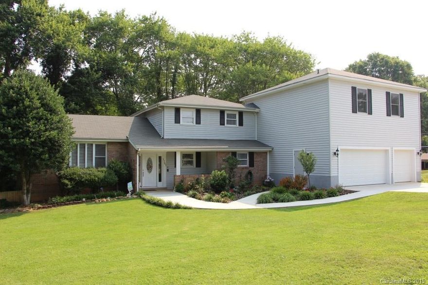 Excellent value in this home with abundant space, new updates & renovations throughout.! There are 4 BR, 3 ½ BA featured in the main house & another 2 BR, full BA, living room & kitchen in a separate in-law apartment above the garage. The living room has a gas log, stacked stone FP w/ bay windows offering lots of natural light. Eat-in kitchen has many updates, SS appliances, new cabinets, granite counter tops & formal dining room. The MBR features a MBA & large sitting/computer area.